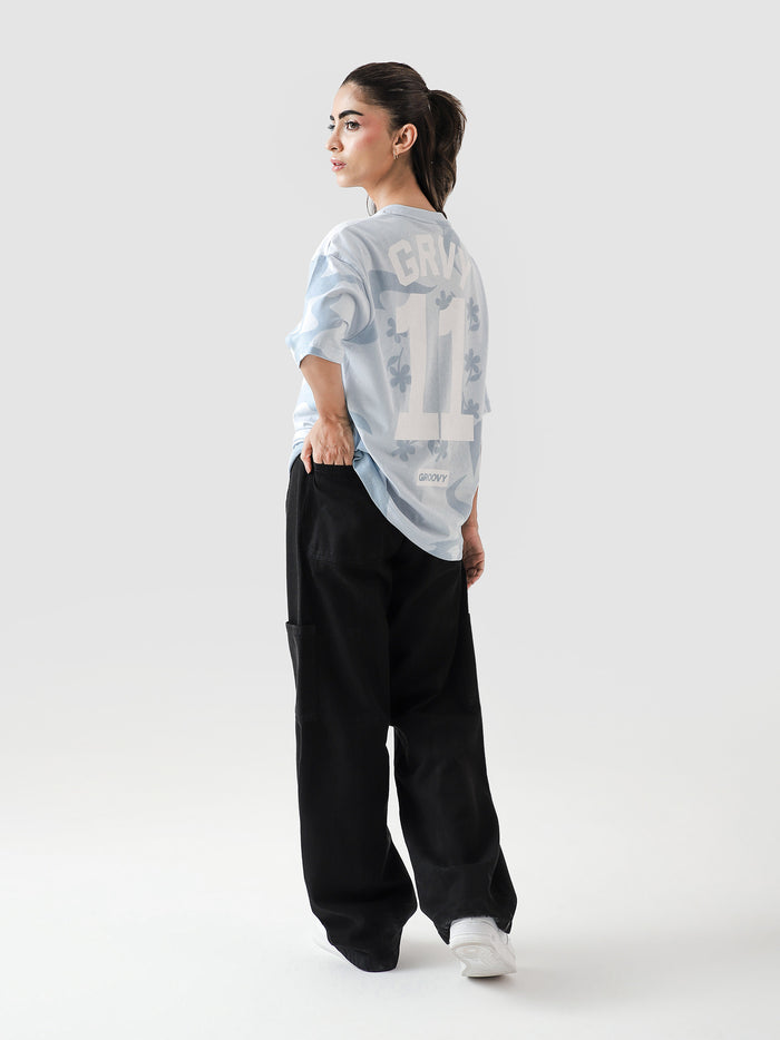 Allover GRVY frost blue tee male model outdoor lifestyle shot Pakistan – GROOVY