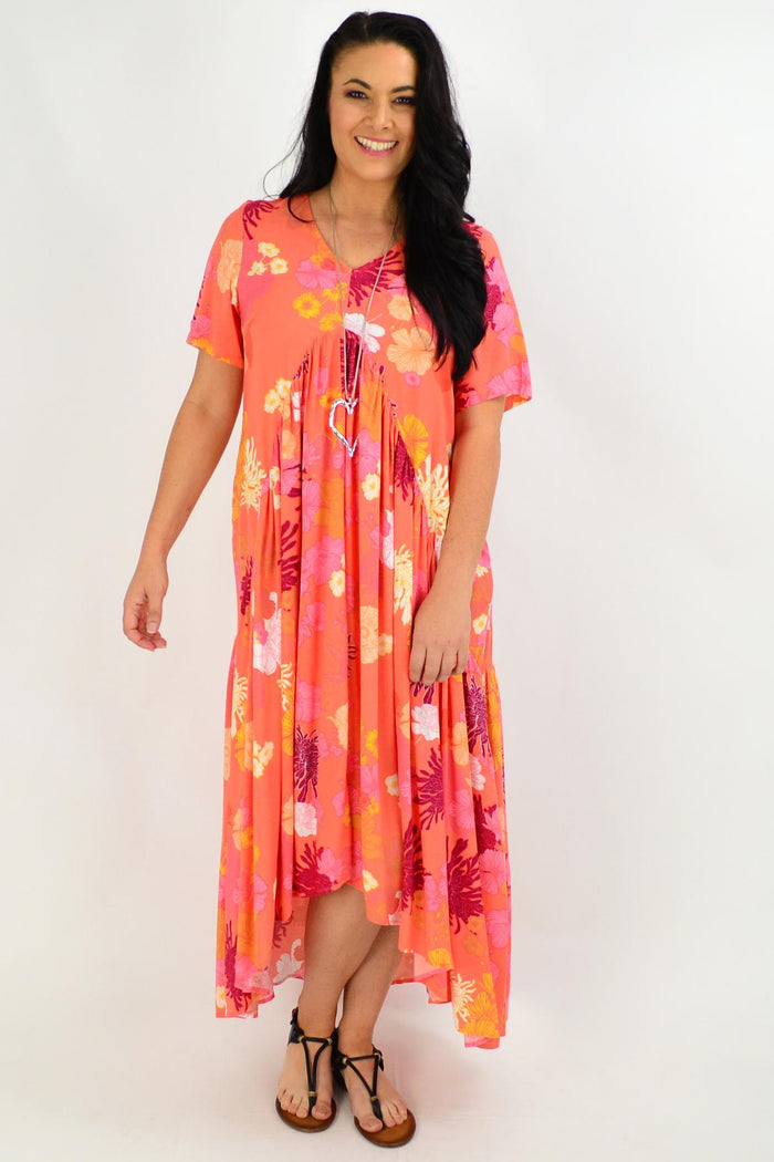 Apricot floral maxi tunic dress from New U Collection, showing its flowy fabric and vibrant floral pattern.