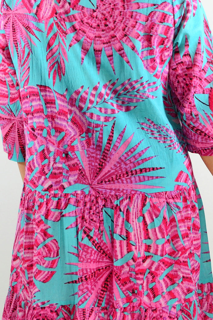 Aqua pink Beth tunic dress by One Summer featuring flowy fabric and casual style, displayed on a hanger against a neutral background.