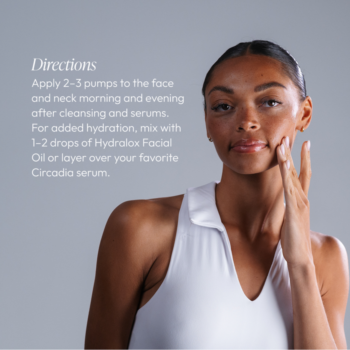 A woman gently applying AquaPorin Hydrating Cream | Circadia to her face with directions for use displayed beside her on a neutral background.