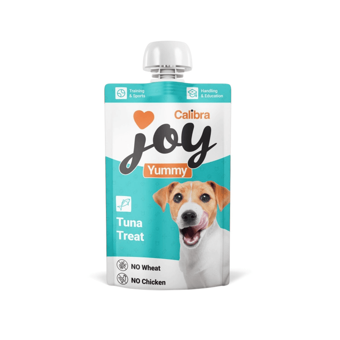 White background with a white and blue pouch of Calibra Joy Yummy paste treat in Tuna flavour.