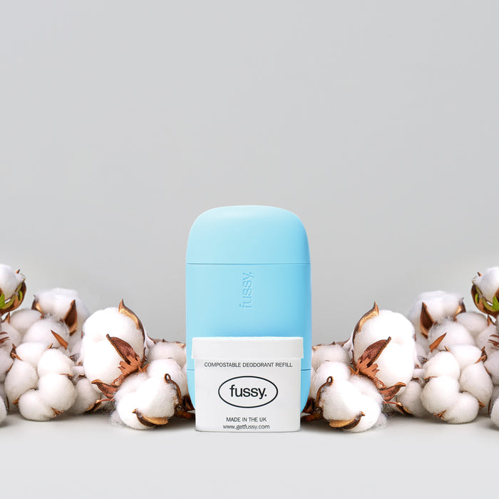 Fussy's natural, refillable deodorant starter pack in Cloud Nine scent (cotton, sandalwood, vetiver) with deodorant case in Blue colour.