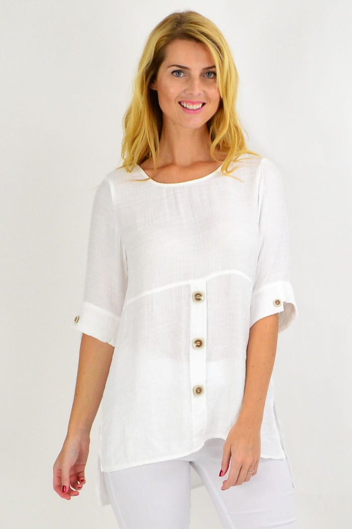 White square-button tunic top by Willow Tree featuring a relaxed fit and clean, creamy white fabric.