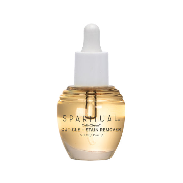 Clear golden liquid in a small glass dropper bottle labeled Cuti-Clean Vegan Cuticle & Stain Remover | Sparitual, designed for skincare and nail care.
