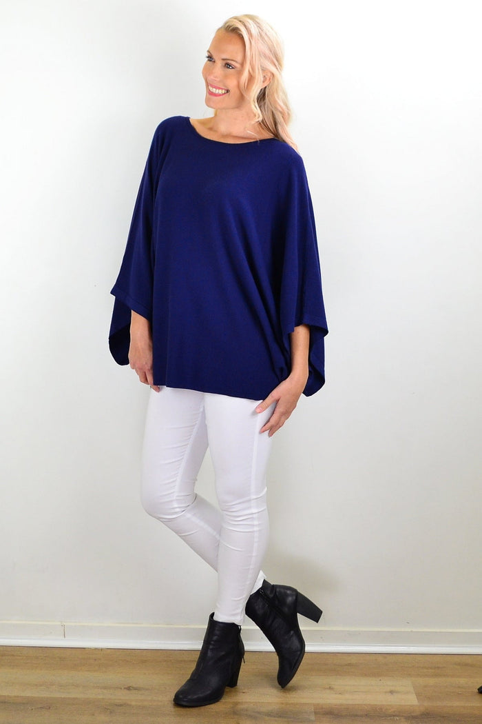 Navy blue rounded tunic poncho from Cali&Co, featuring a cozy, draped design perfect for casual wear.