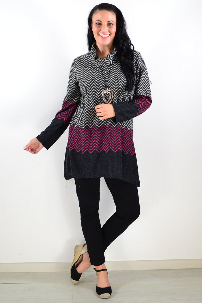 Pink zig zag pattern roll neck winter tunic by Whispers, featuring cozy fabric and stylish design, perfect for cold weather.