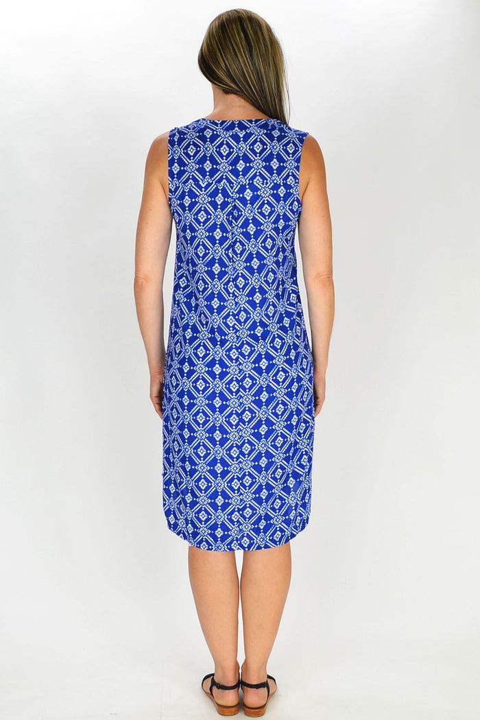MSTYLE Snow Flake Tunic featuring a detailed snowflake pattern and relaxed fit, displayed hanging against a neutral background.