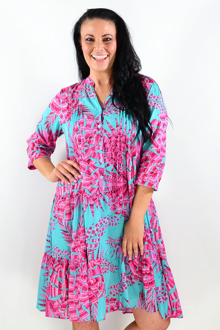 Aqua pink Beth tunic dress by One Summer, lightweight tunic with flowing fabric and short sleeves, displayed on a hanger.