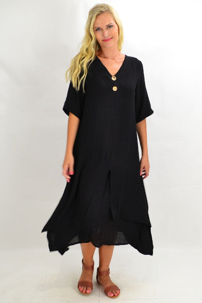 Black coconut overlay tunic dress by La Mode, featuring a long, flowing design with intricate overlay details.