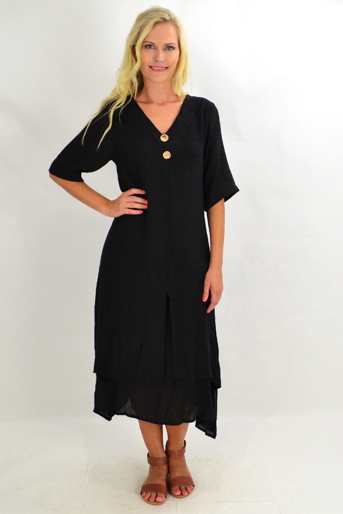 Black coconut overlay tunic dress from La Mode, featuring a stylish flowy design and intricate coconut pattern detailing.