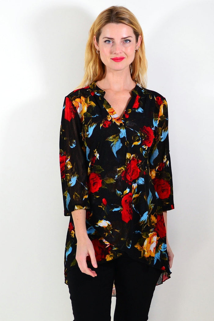 Black floral mesh ladies tunic top by Whispers, featuring a stylish and lightweight design with floral patterns and mesh fabric.