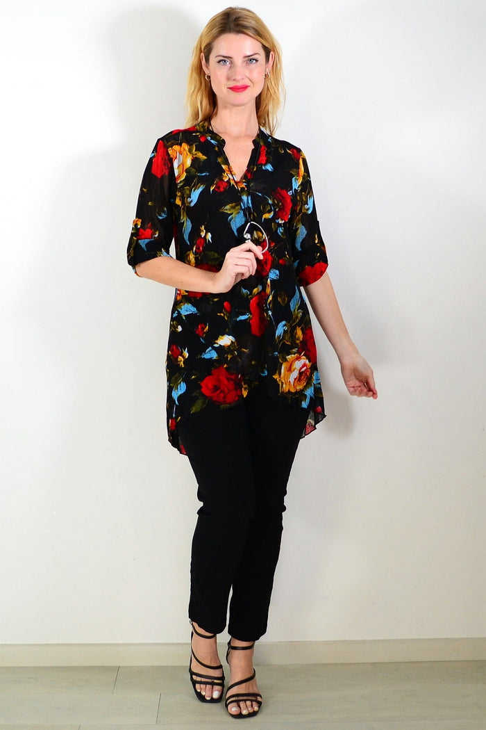 Black floral mesh tunic top for women by Whispers, featuring a lightweight, flowing design with intricate floral patterns.
