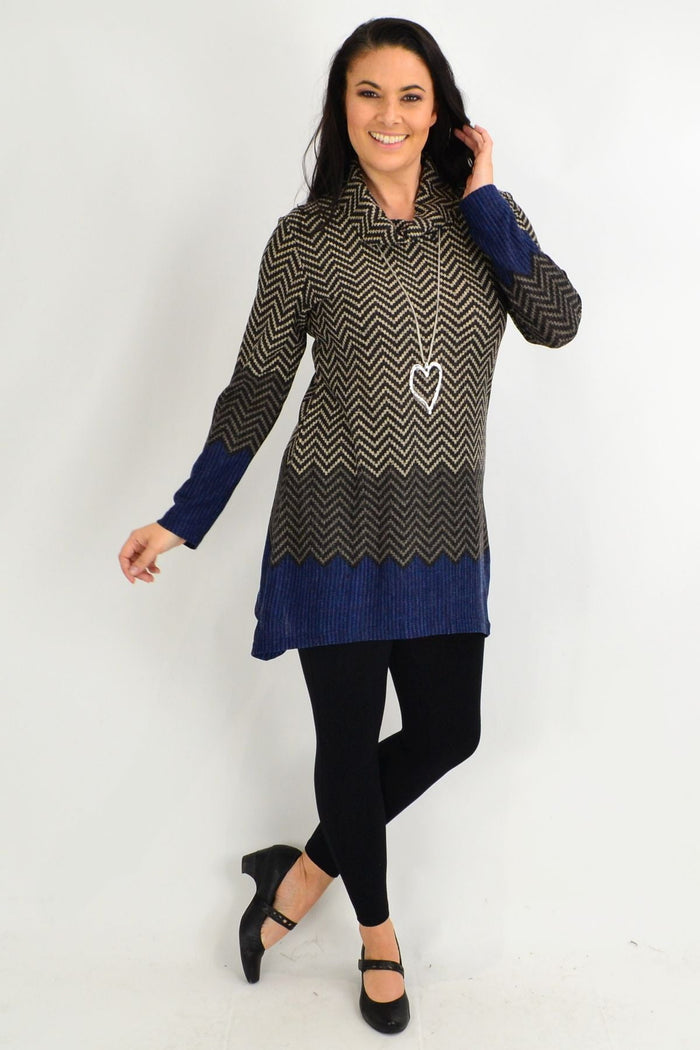 Blue zigzag roll neck winter tunic by Whispers, featuring a cozy design and stylish pattern, perfect for cold weather.