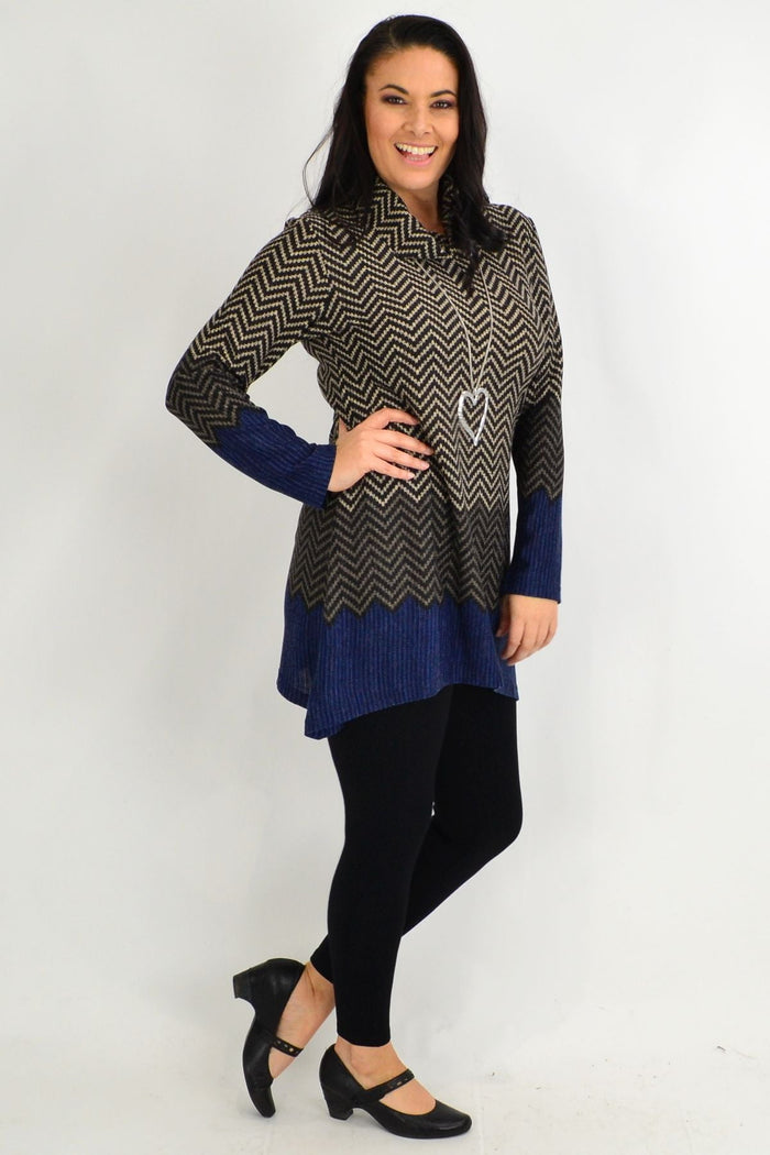 Blue zigzag patterned Whispers winter tunic with a roll neck, stylish and cozy for cold weather.