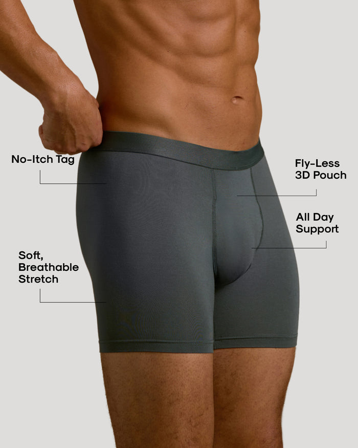 Man wearing Carbon Boxer Brief showcasing no-itch tag, breathable stretch, and supportive fly-less pouch.