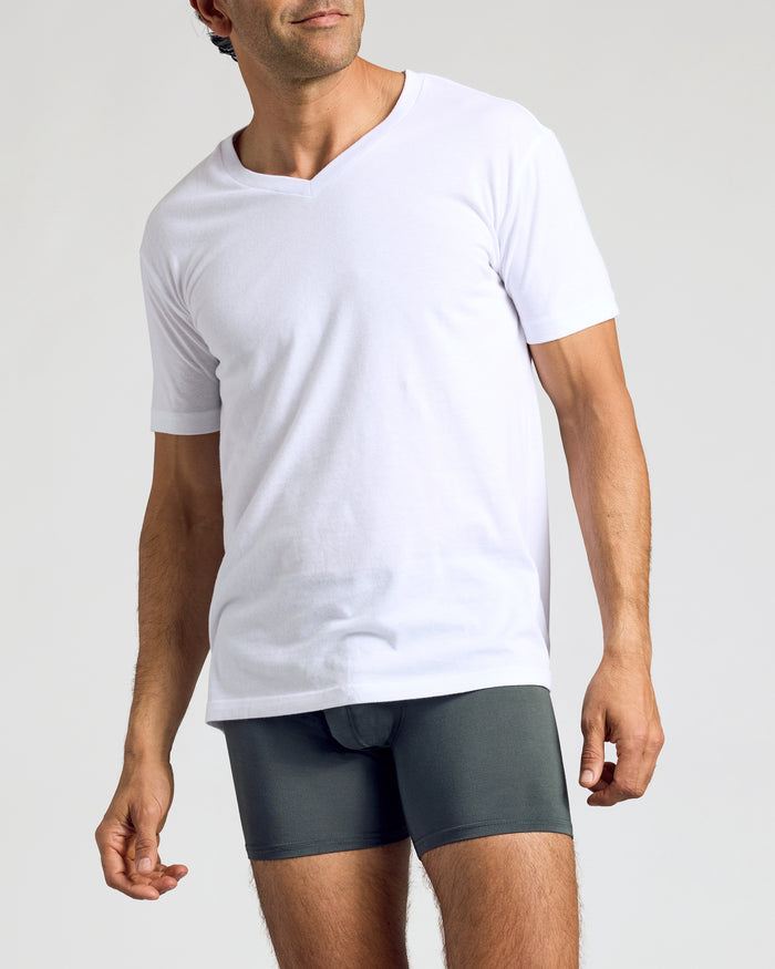Man wearing Carbon Boxer Brief and white V-neck T-shirt, highlighting fit.