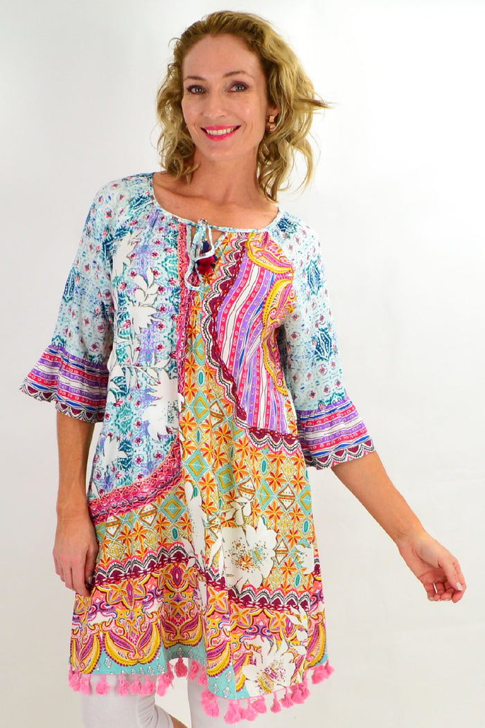 Orientique Chateau 3/4 sleeve tunic dress with floral print, relaxed fit, and lightweight fabric, perfect for casual wear.