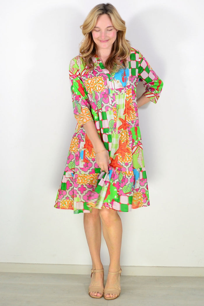 One Summer Coastal Vacation Beth Tunic Dress with a flowy, lightweight fabric and beach-inspired pattern, perfect for summer outings.