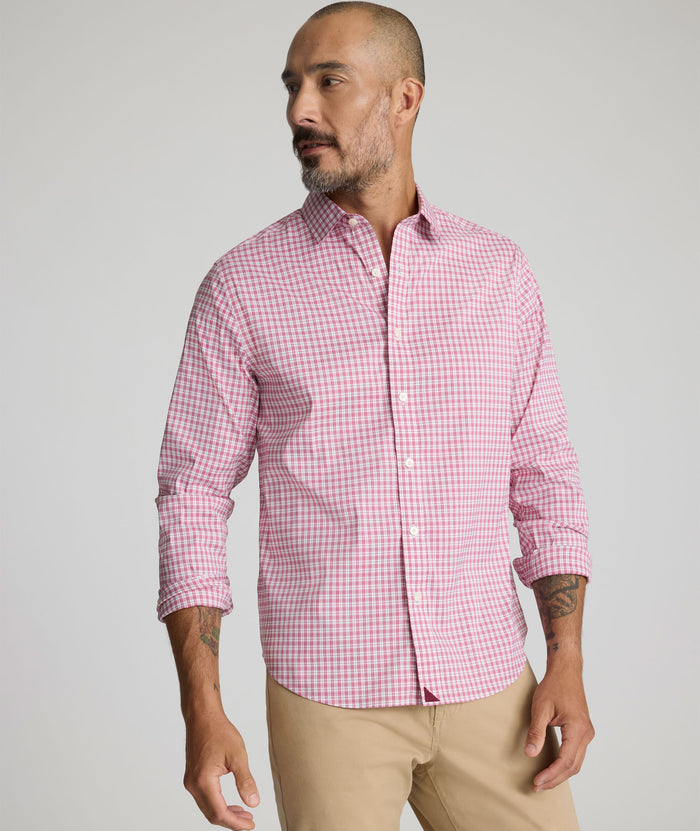Model is wearing UNTUCKit Kaiser cottontek shirt in red.
