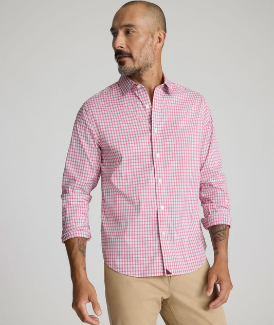Model is wearing UNTUCKit Kaiser cottontek shirt in red.