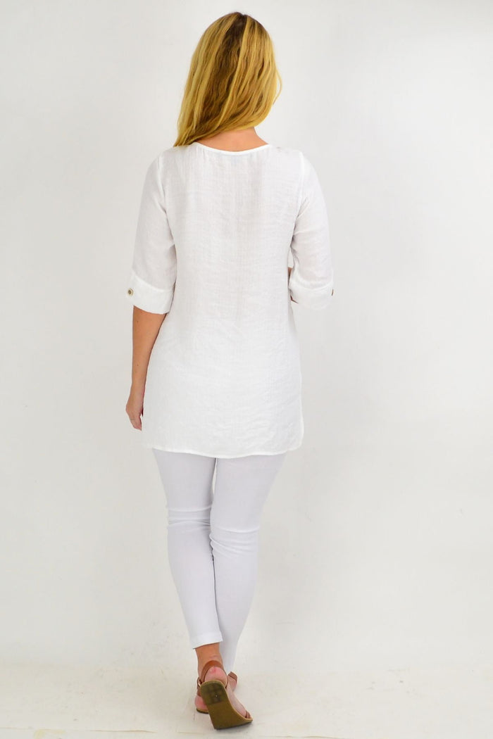 Creamy white square button tunic top by Willow Tree featuring a relaxed fit and stylish design.