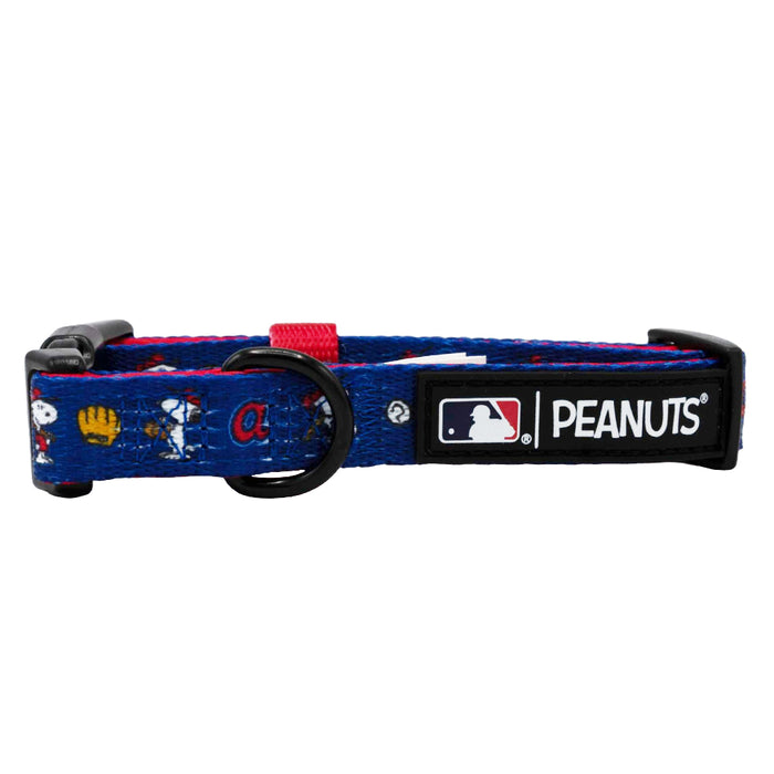 The Sassy Woof Dog Collar - MLB™ x Peanuts™ Atlanta Braves™ features Peanuts characters and baseball images, plus a black patch with the MLB logo and “PEANUTS”—perfect for Snoopy fans who love stylish dog accessories.