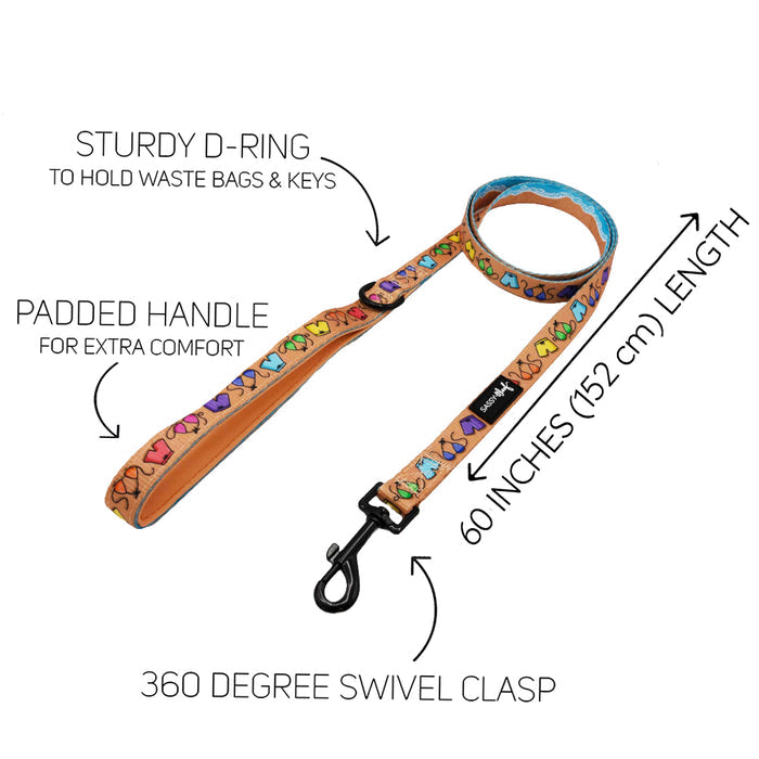 The Sassy Woof Dog Leash - Beach Bod features a vibrant heart pattern, soft neoprene handle, sturdy D-ring for bags or keys, 60-inch (152 cm) length, and a 360° swivel clasp. Matching collar available. Text labels highlight each feature.