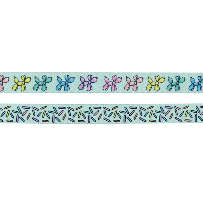 The Sassy Woof Dog Leash - Pup Pup Hooray features pastel balloon dog illustrations atop and a playful sprinkle pattern below on a light blue background, with a soft neoprene handle—perfect for your pup’s daily walk!.