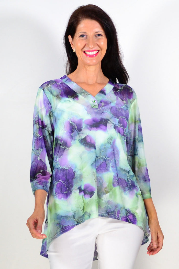 Green and purple mesh ladies tunic top by Whispers, close-up showing lightweight fabric and stylish design.