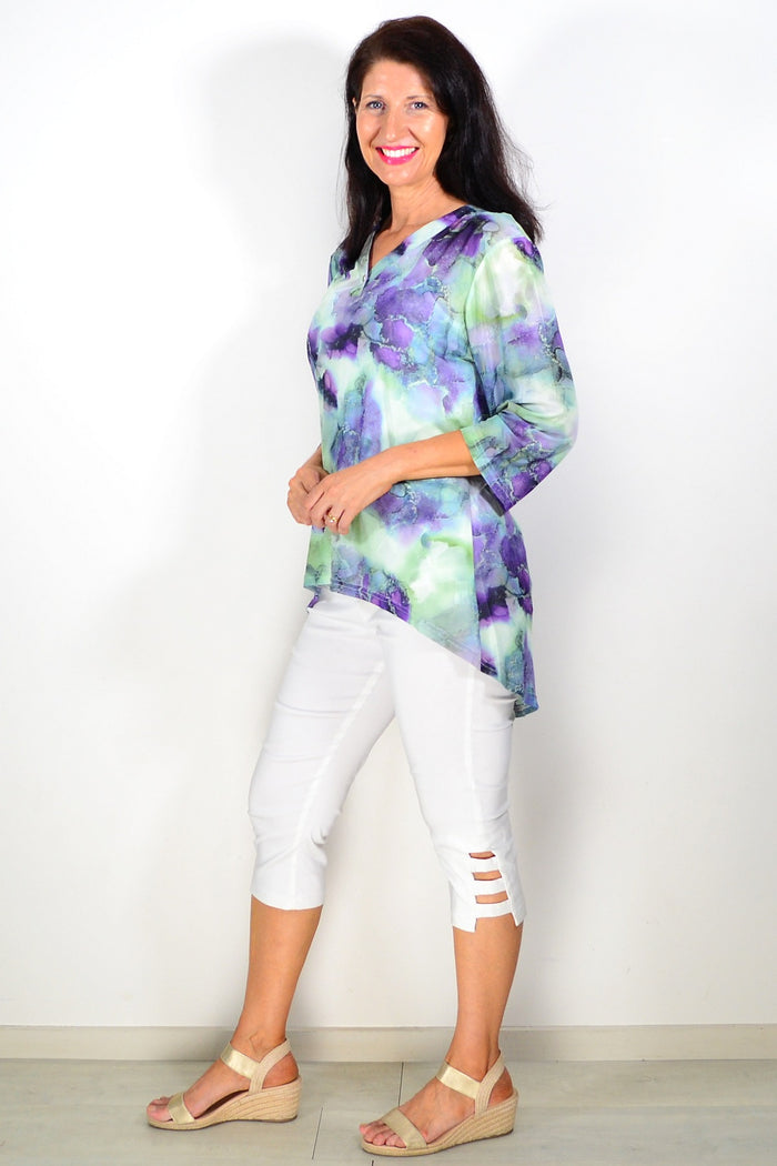 Green and purple mesh ladies tunic top by Whispers, featuring a flowy design with long sleeves and a relaxed fit.