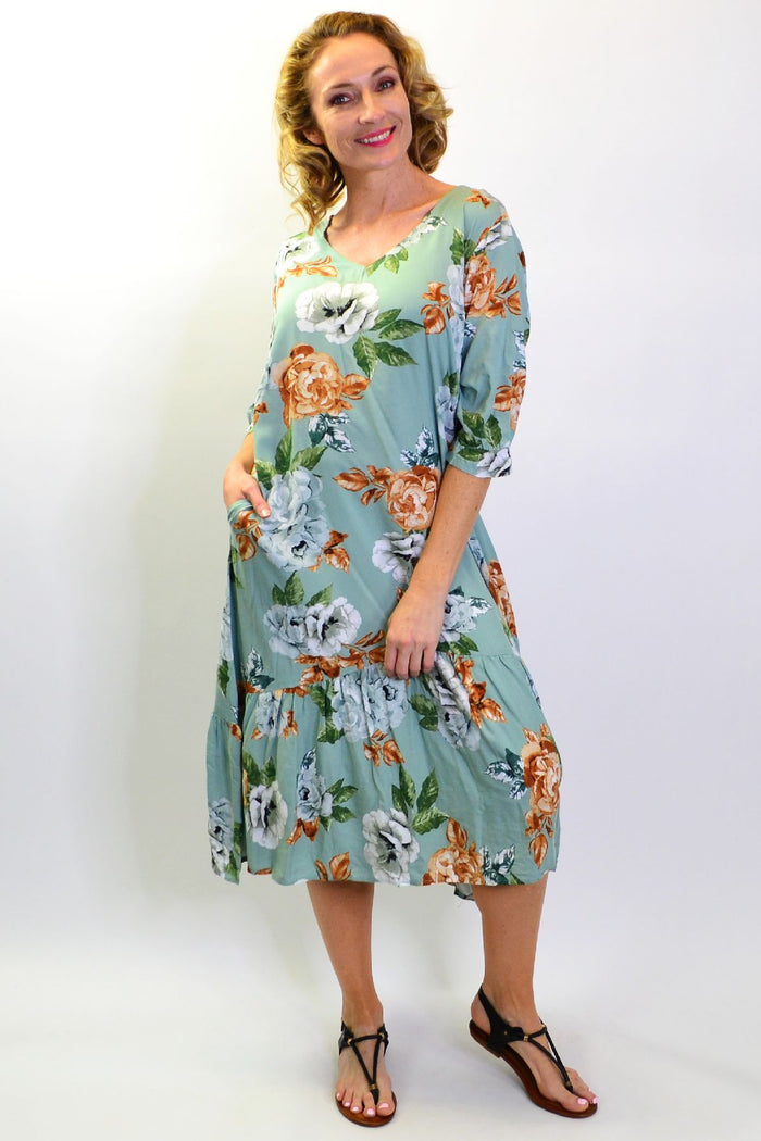 Green floral Wild Rose tunic slip dress by I Love Tunics, long and flowy with a vibrant floral pattern.