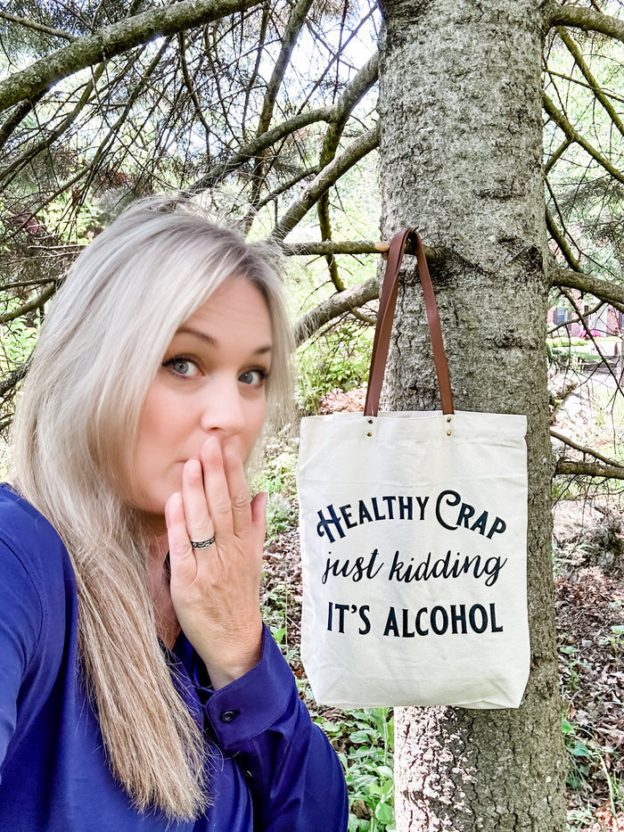 Woman with Healthy Crap tote bag, Facetune edit