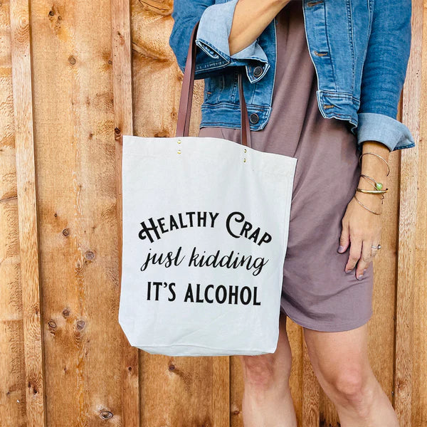 Tote bag that says Healthy Crap, Just Kidding, It's Alcohol