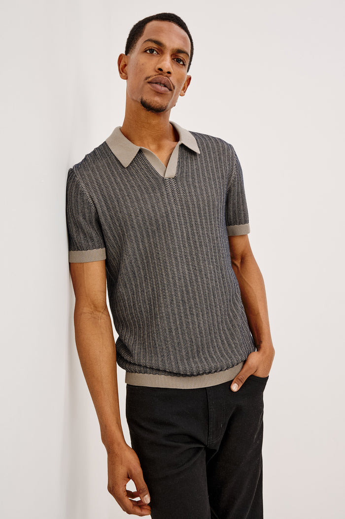 Langley Polo Shirt in Lightweight Contrast Open Birdseye Knit With Classic Fit, Open Collar, Short Sleeves, and Ribbed Trim in Oat Midnight Ripple Colorway - Upper Body Front View Featured on Model