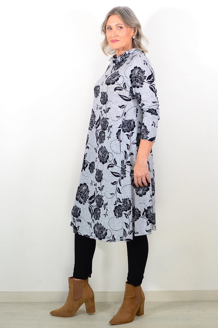 Long black floral La Mode winter tunic with a roll neck and long sleeves, featuring a floral pattern on soft fabric.