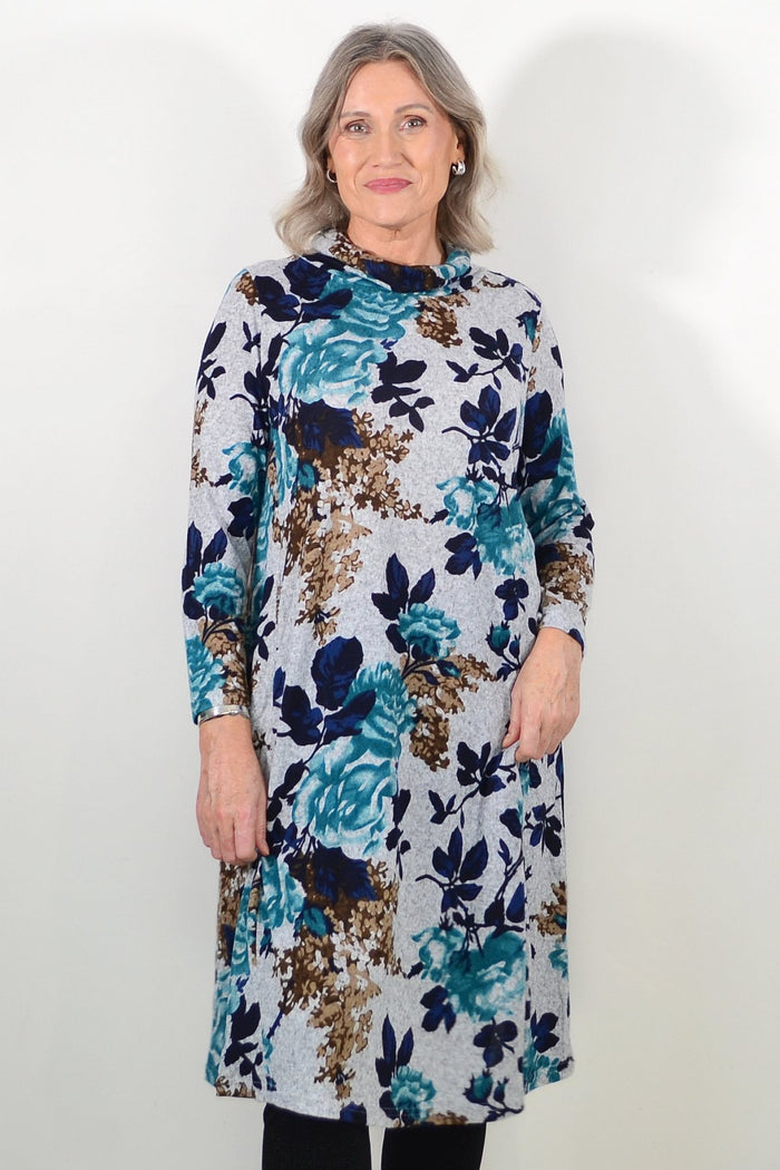 Long green floral La Mode winter tunic with roll neck and long sleeves, featuring a floral pattern and cozy fabric.
