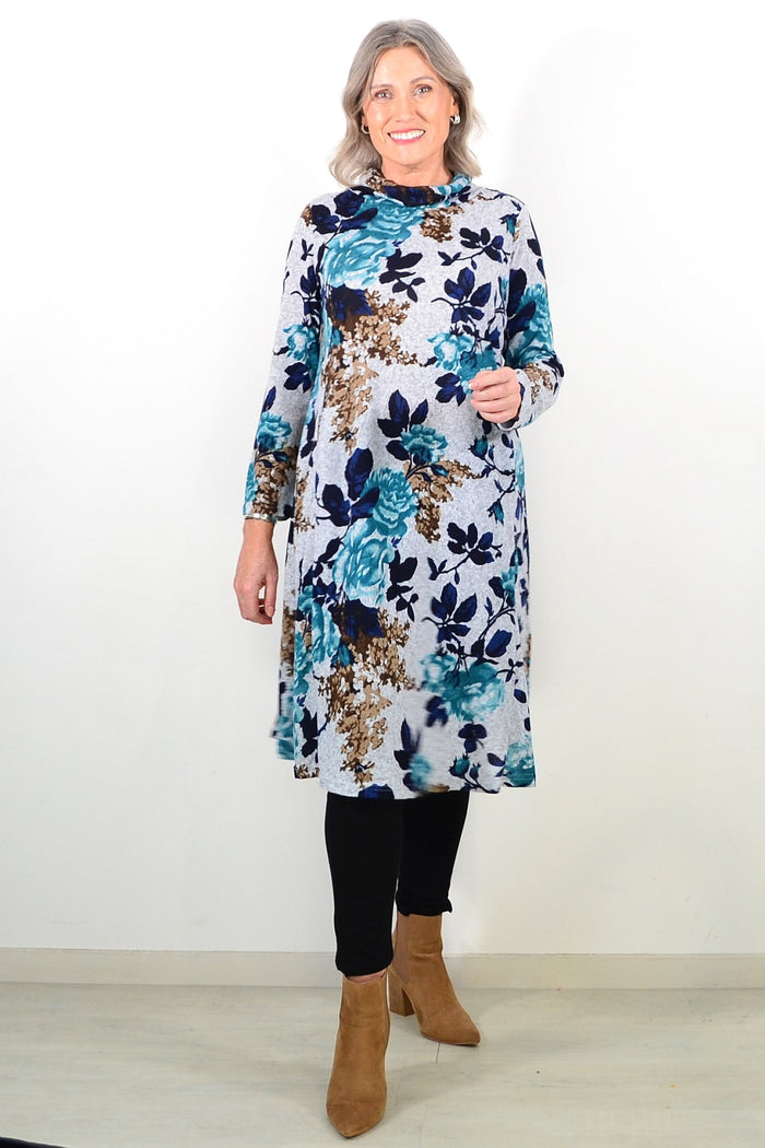 Long green floral La Mode winter tunic with roll neck, featuring a cozy, floral-printed design and relaxed fit.
