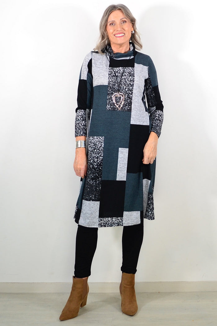 Long grey and black roll neck winter tunic by La Mode, featuring a cozy fit and versatile design, front view.