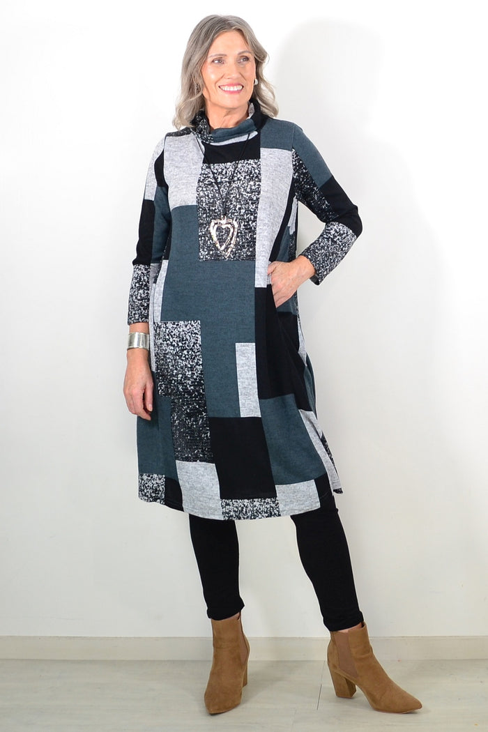 Long grey and black roll neck winter tunic by La Mode, featuring a cozy fit and stylish design, shown on a mannequin.