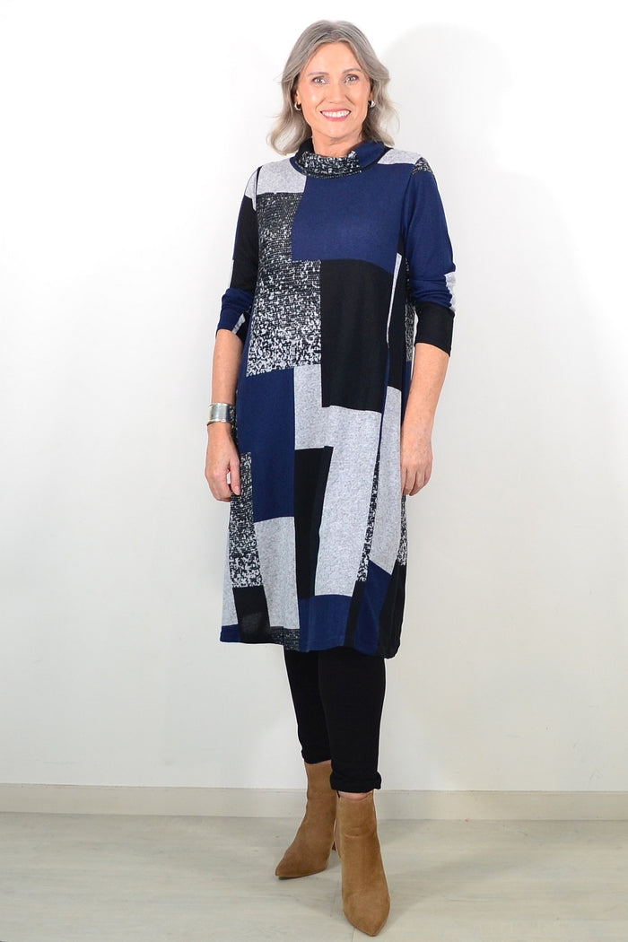 Long navy grey roll neck winter tunic by Hourglass Avalon, featuring a cozy high neckline and relaxed fit.