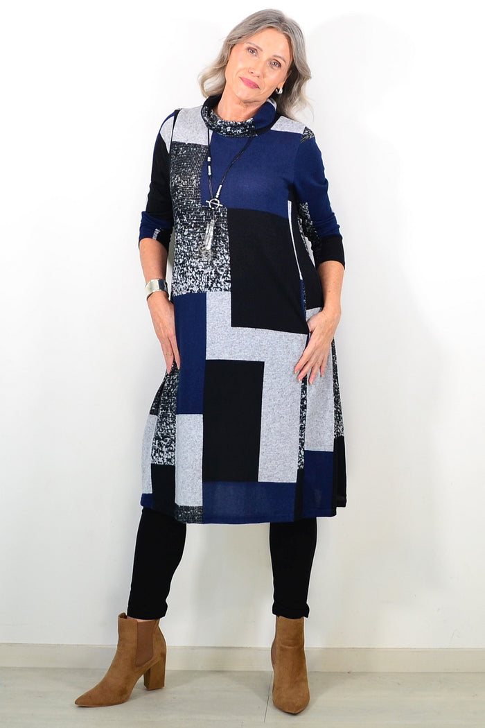 Long navy grey roll neck winter tunic by Hourglass Avalon, featuring a cozy fit and stylish design in soft fabric.