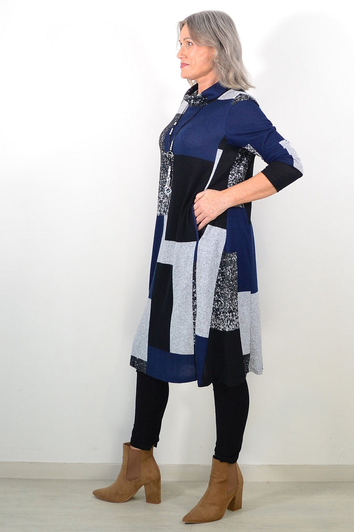 Long navy grey roll neck winter tunic by Hourglass Avalon, featuring a cozy, fitted design and soft fabric for cold weather.