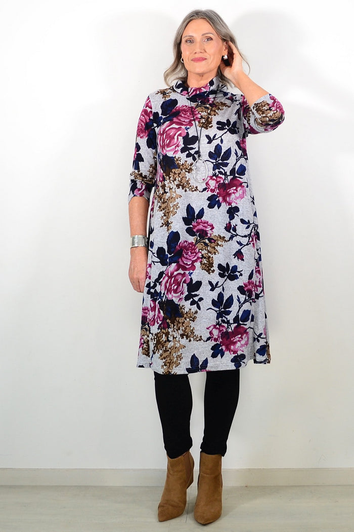 Long pink floral La Mode winter tunic with roll neck and long sleeves, featuring a cozy, feminine floral pattern.