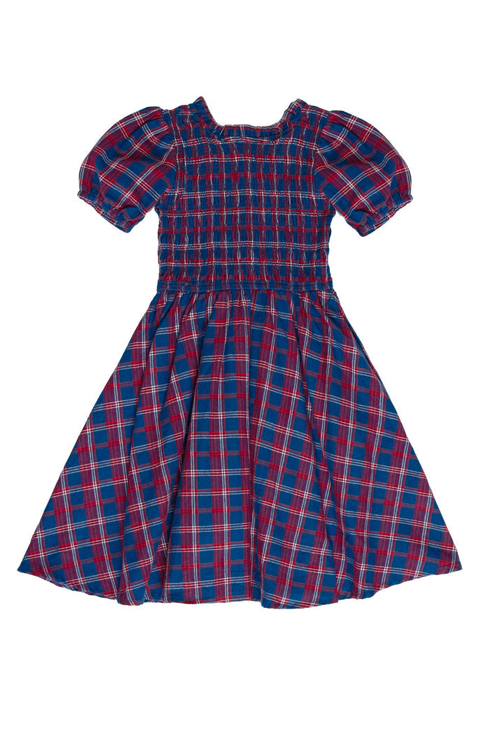 The Mini Mariah Dress in Mariner Tartan by Ivy City Co features short sleeves, a knee-length cut, a classic red and blue Mariner Tartan plaid pattern, a smocked bodice, and puffed sleeves—perfect for coordinating mommy and me outfits.