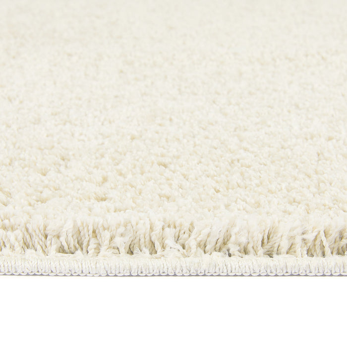 Ivory Washable Rug in a solid white colour, fully machine washable.