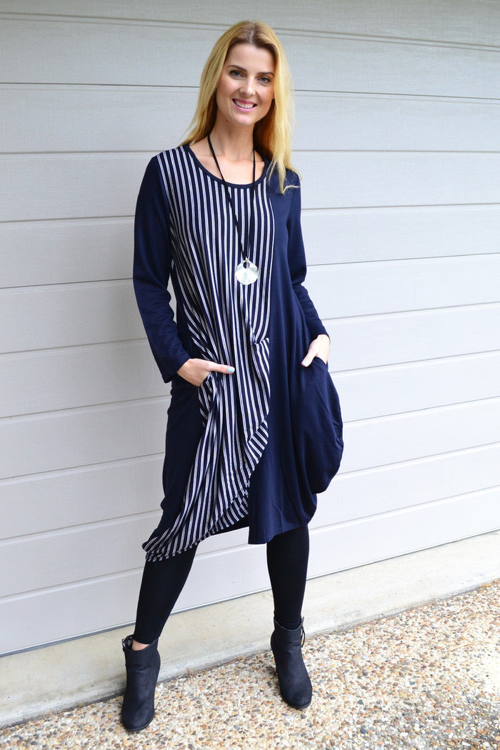 Navy 3/4 sleeve stripe jersey tunic dress by Whispers, featuring a relaxed fit and horizontal stripe pattern displayed on a model.