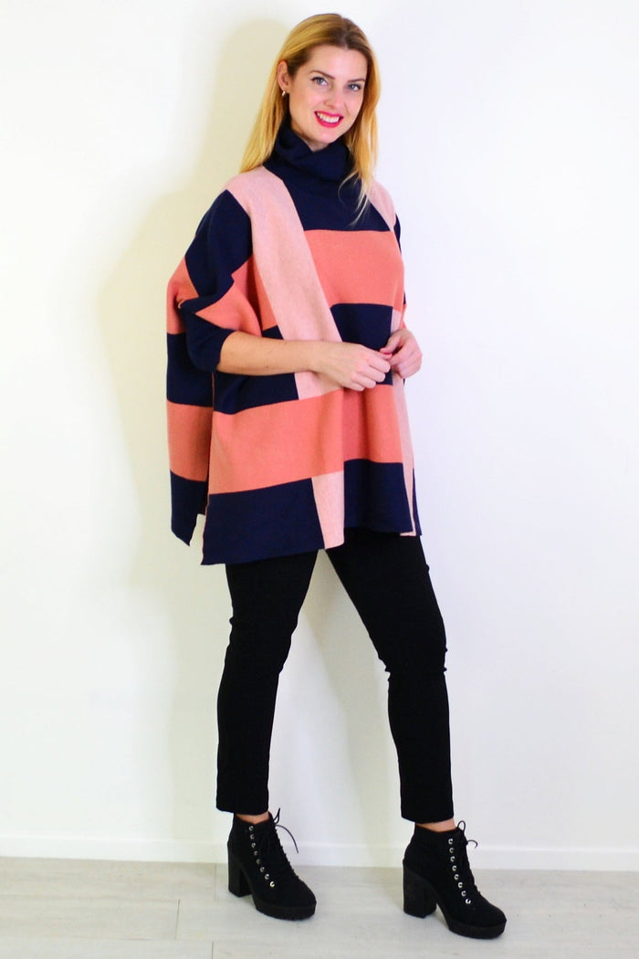 Navy and pink Caroline Morgan free size cardigan poncho draped over a mannequin, showcasing its lightweight tunic style.