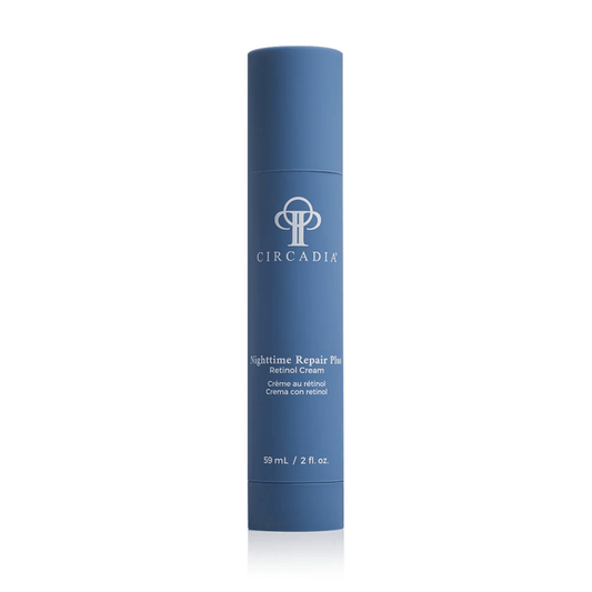 Blue cylindrical bottle of Nighttime Repair Plus | Circadia retinol cream for skincare, featuring simple branding and a clean, minimalist design.