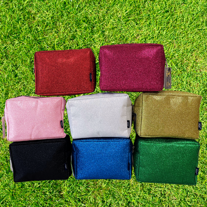 glitter cosmetic pouch, NGIL makeup bag, cheer makeup pouch, dance toiletry bag, gymnastics travel bag, beauty pageant pouch, competition cosmetic case, travel makeup organizer, glitter toiletry bag, small travel pouch, zip top cosmetic case, glitter carry-on bag, dancer makeup case, cheerleader pouch, gymnast toiletry bag, compact glitter bag, makeup bag for travel, glitter gift pouch, sparkle cosmetic bag, overnight toiletry pouch, portable beauty bag, glitter storage pouch
