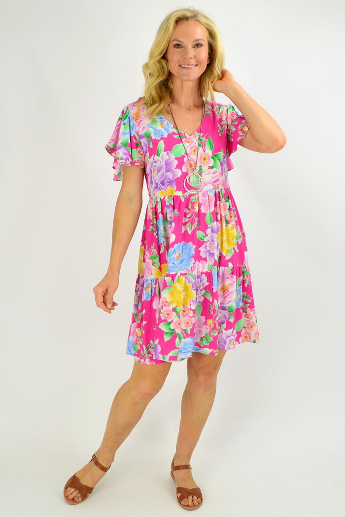 Pink floral garden design on Blue Soul women's tunic dress featuring an oriental flower pattern and relaxed fit.
